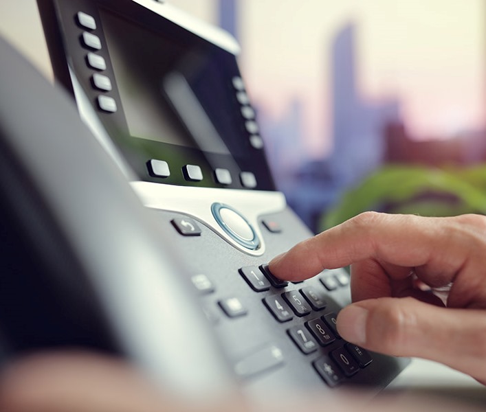A complaint handler about to make a call