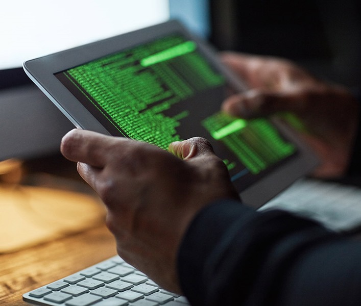 A developer reviewing code on his screen