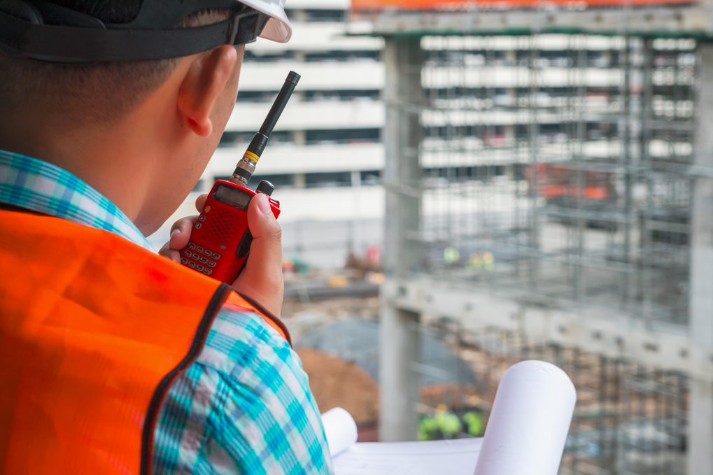 business consultant oversees construction