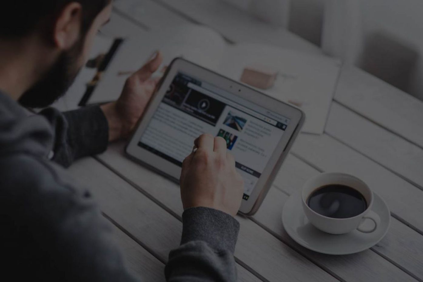 scrolling news on tablet