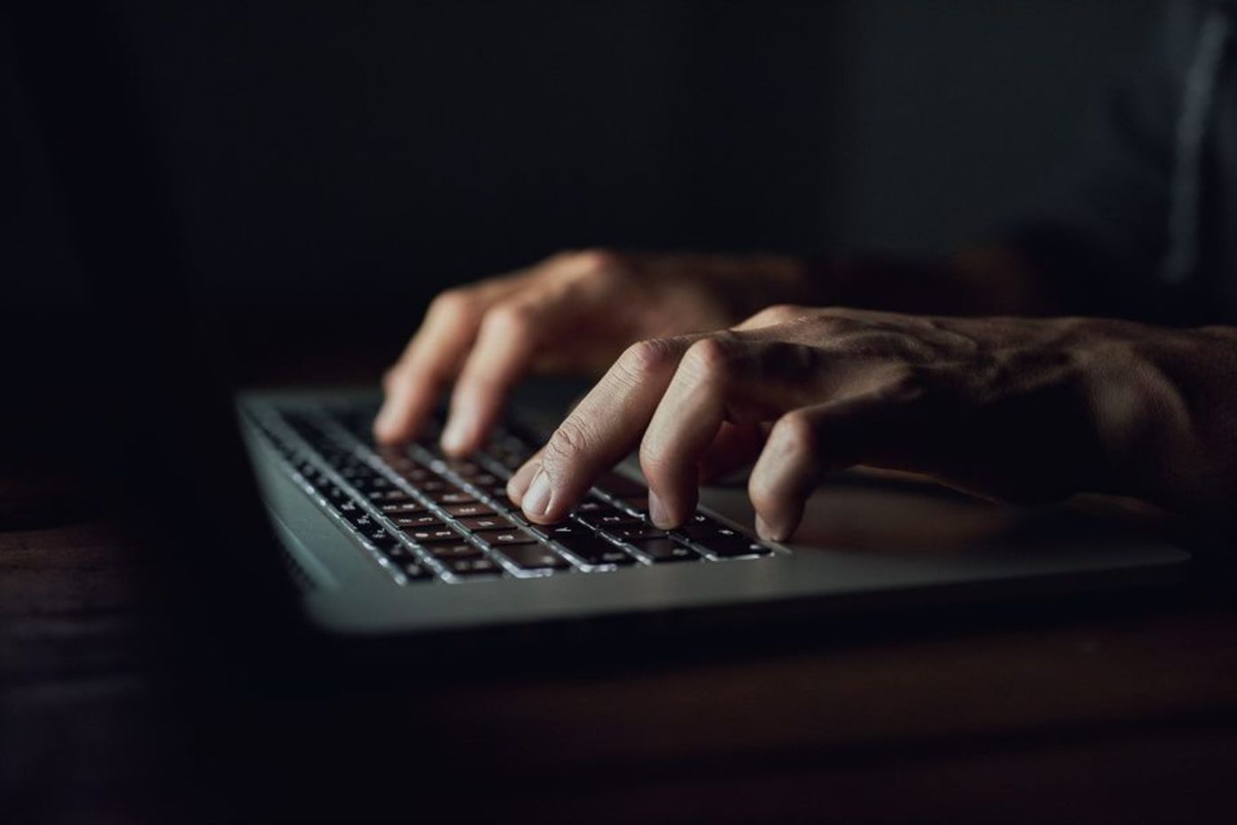 typing at backlit keys