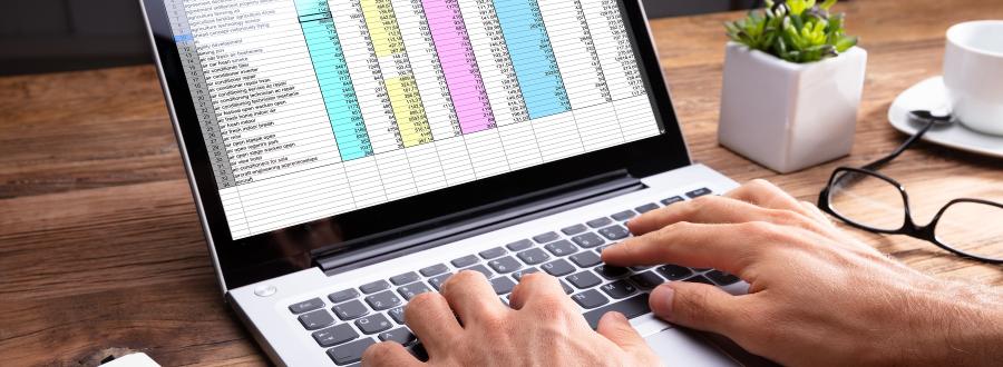 Laptop with spreadsheet data on