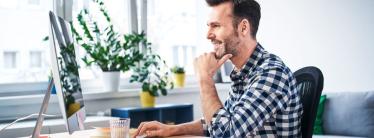 man at computer in office