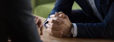 image showing close up of hands during business interview