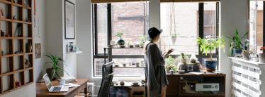A person standing in their home
