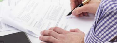 A person signing a contract