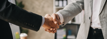 Two people shaking hands