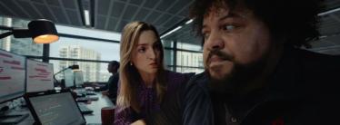 A woman staring angrily at a man