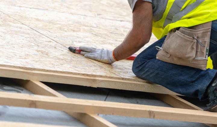 A builder in PPE at work