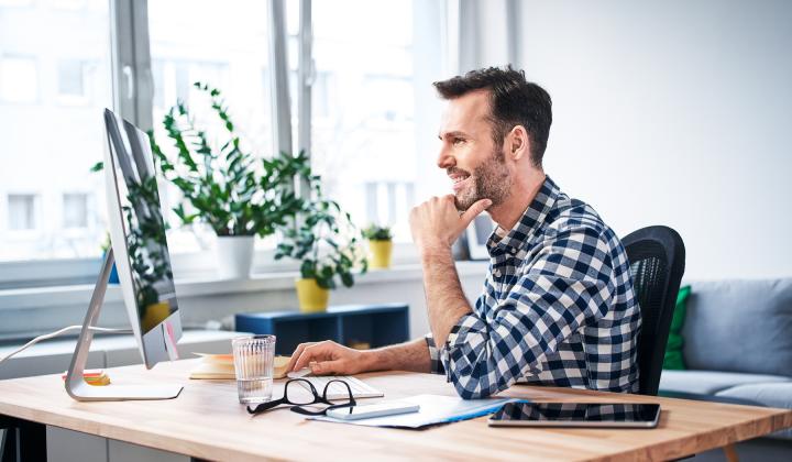 man at computer in office