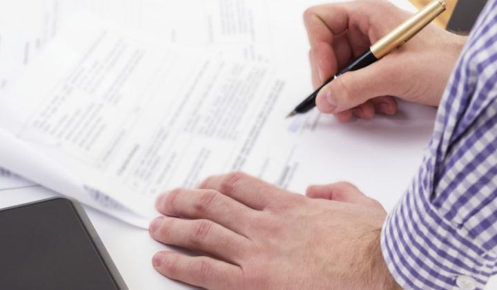 A person signing a contract