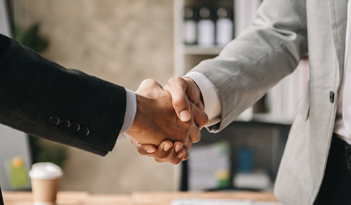 Two people shaking hands
