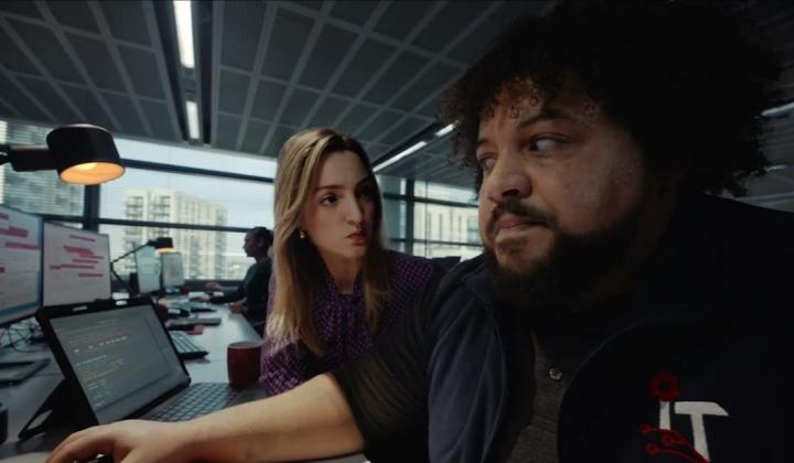 A woman staring angrily at a man