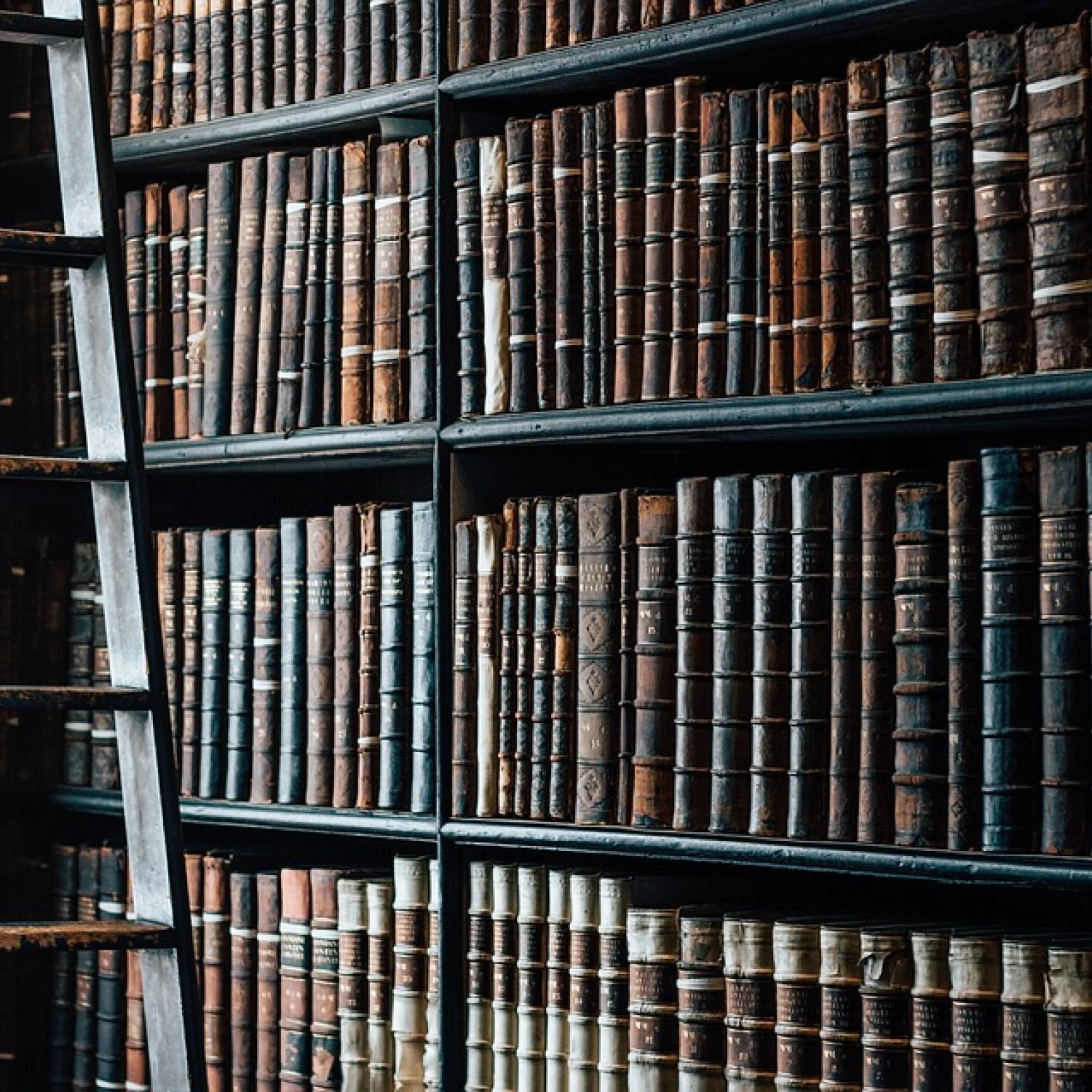 Antique collection of books on bookshelf