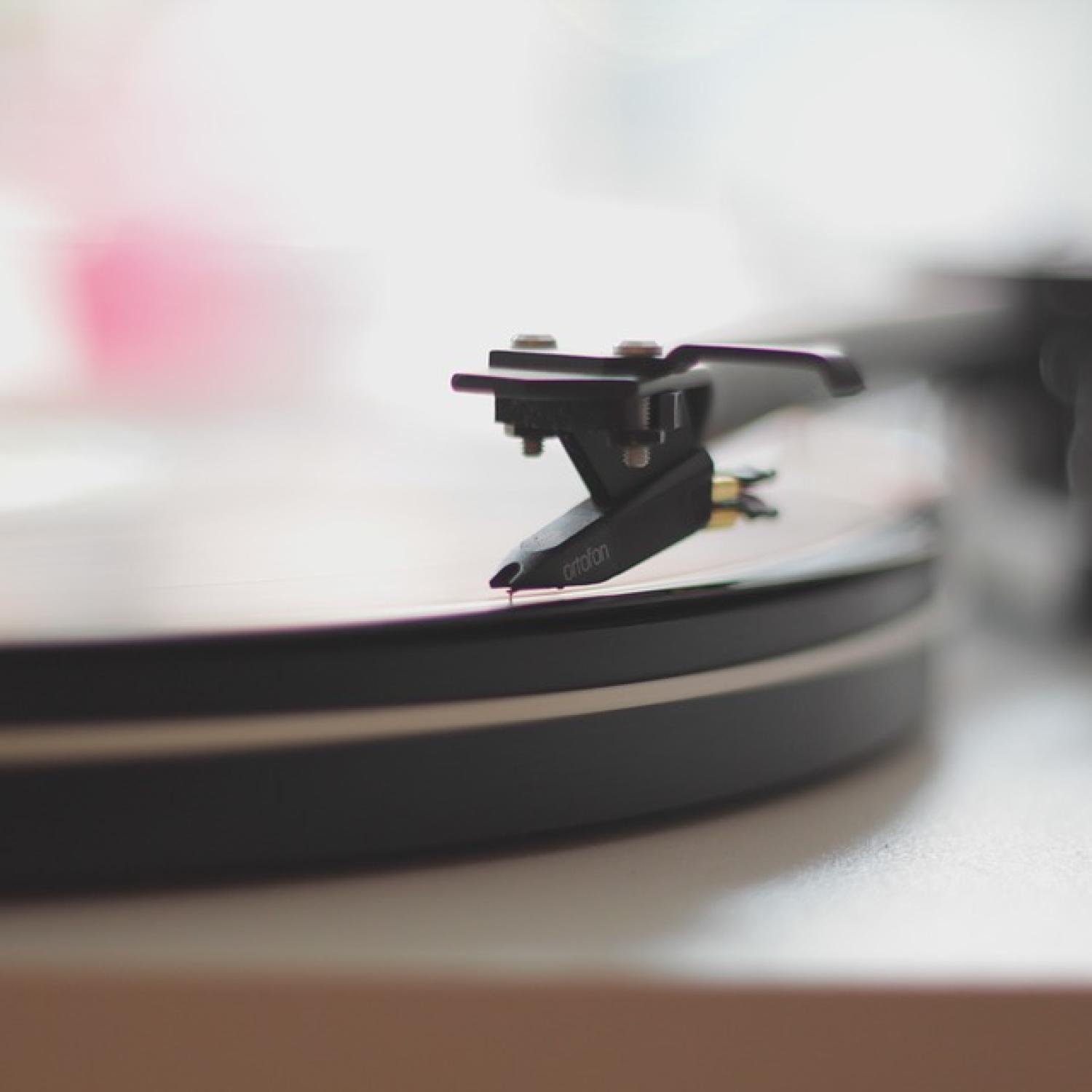 Close up of a vinyl record playing on a record player