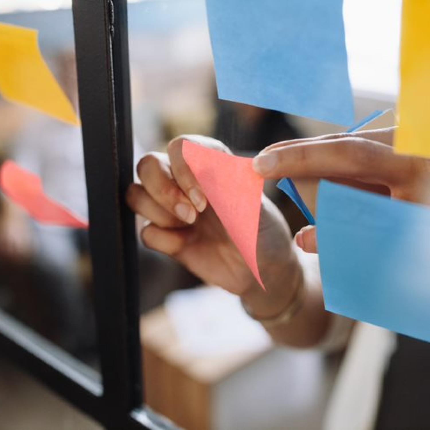 image showing sticky notes on glass