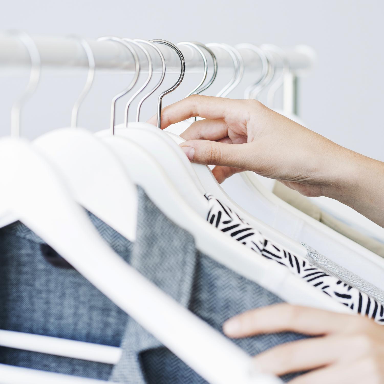 clothes on hangers on a rail