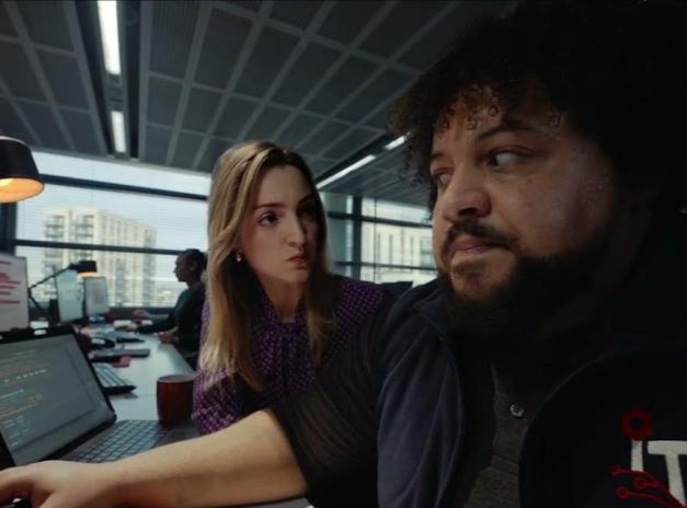 A woman staring angrily at a man