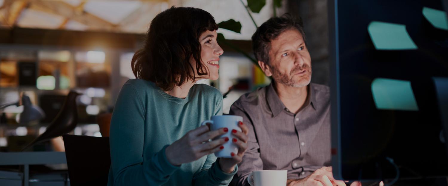 Marketing and designers looking at computer