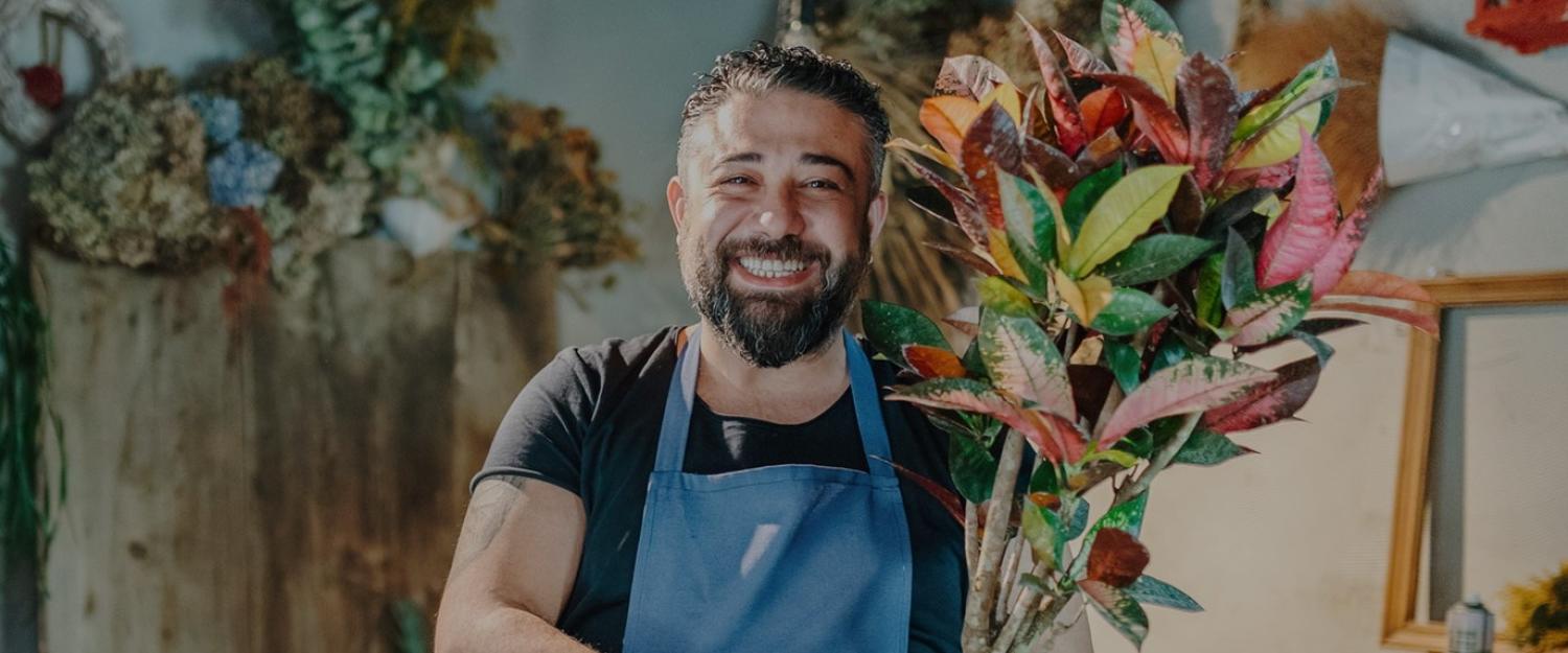 image showing florist smiling