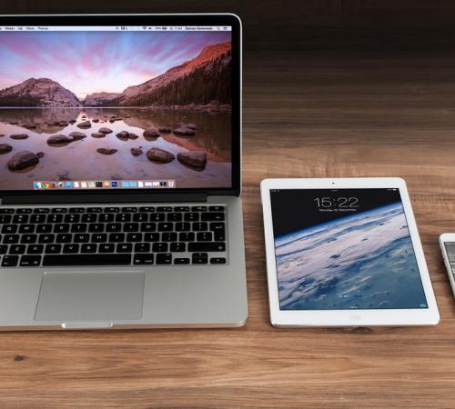 latop tablet and phone on desk
