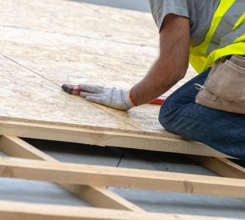 A builder in PPE at work