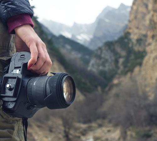 photographer doing a shoot in the wilderness