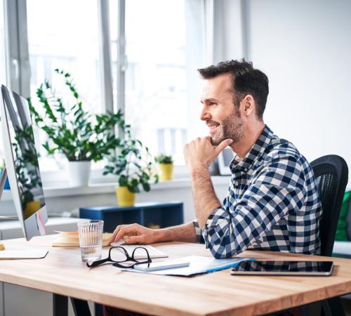 man at computer in office