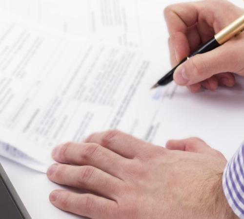 A person signing a contract