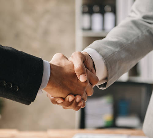 Two people shaking hands