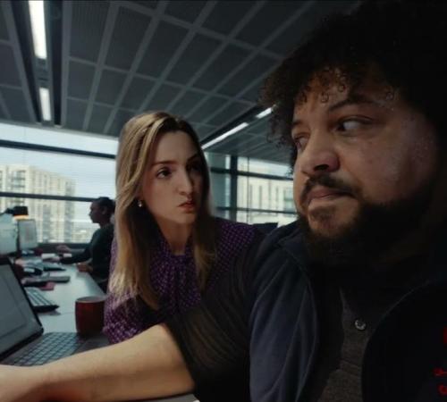A woman staring angrily at a man