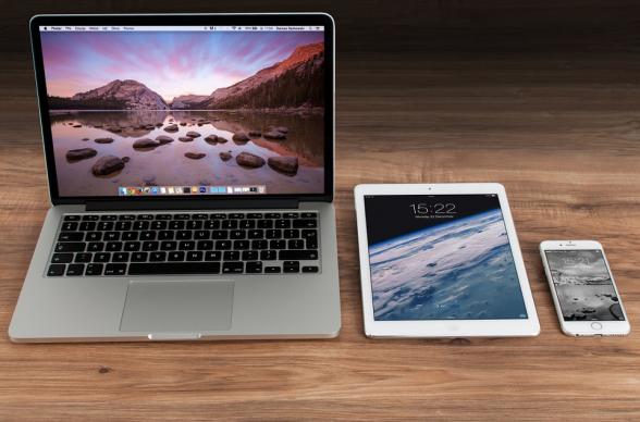 latop tablet and phone on desk