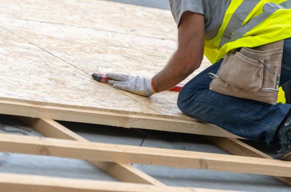 A builder in PPE at work