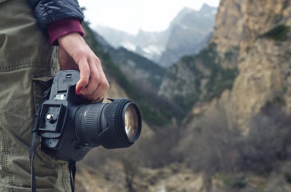 photographer doing a shoot in the wilderness