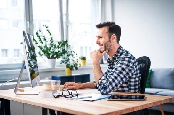 man at computer in office