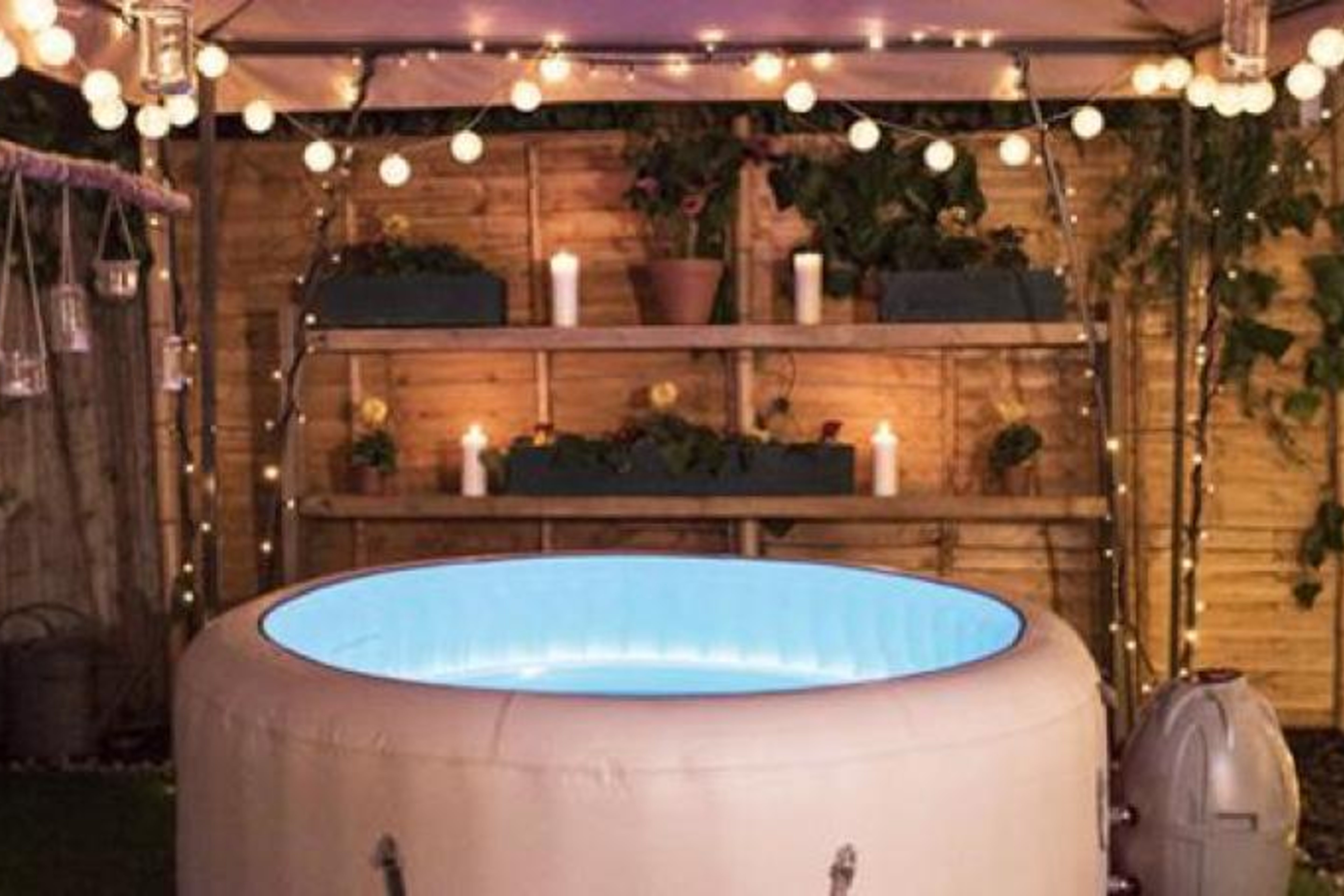 hot tub surrounded by fairylights
