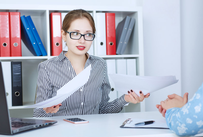 Woman Negotiating in a Meeting