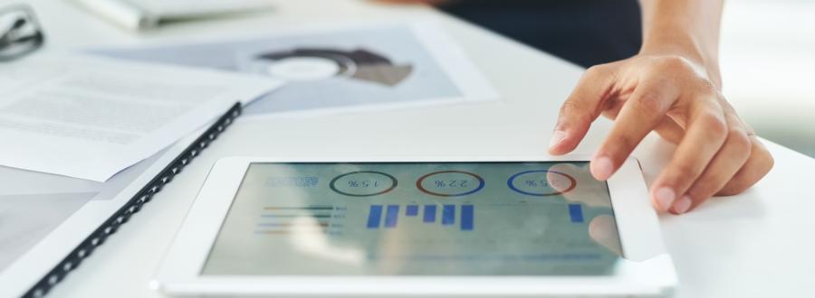 SME founder runs analytics using tablet