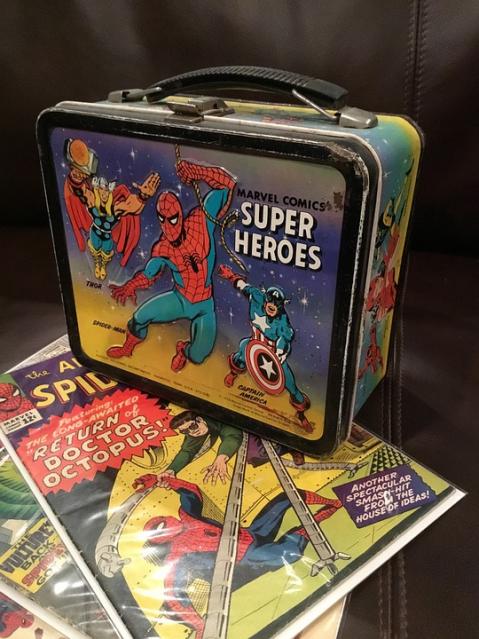 Spider-Man lunchbox with comic book collection