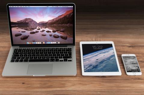 latop tablet and phone on desk