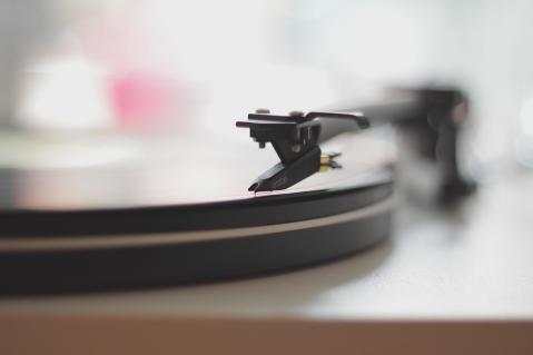 Close up of a vinyl record playing on a record player