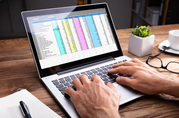 Laptop with spreadsheet data on
