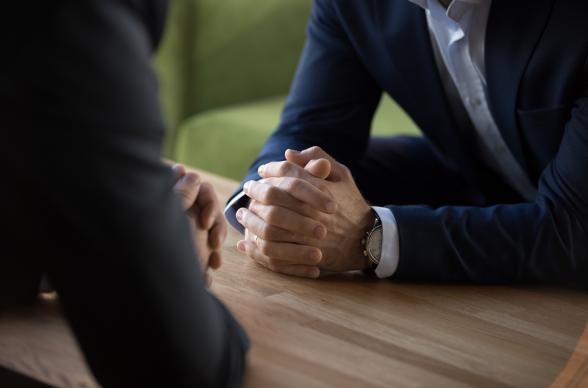 Two People Meeting Negotiation