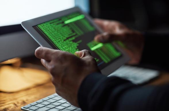 a tablet with computer code